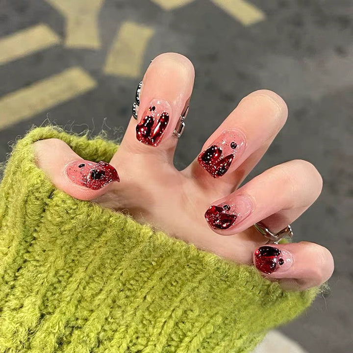 Glamorous artificial nails with sparkling accents Kalsten