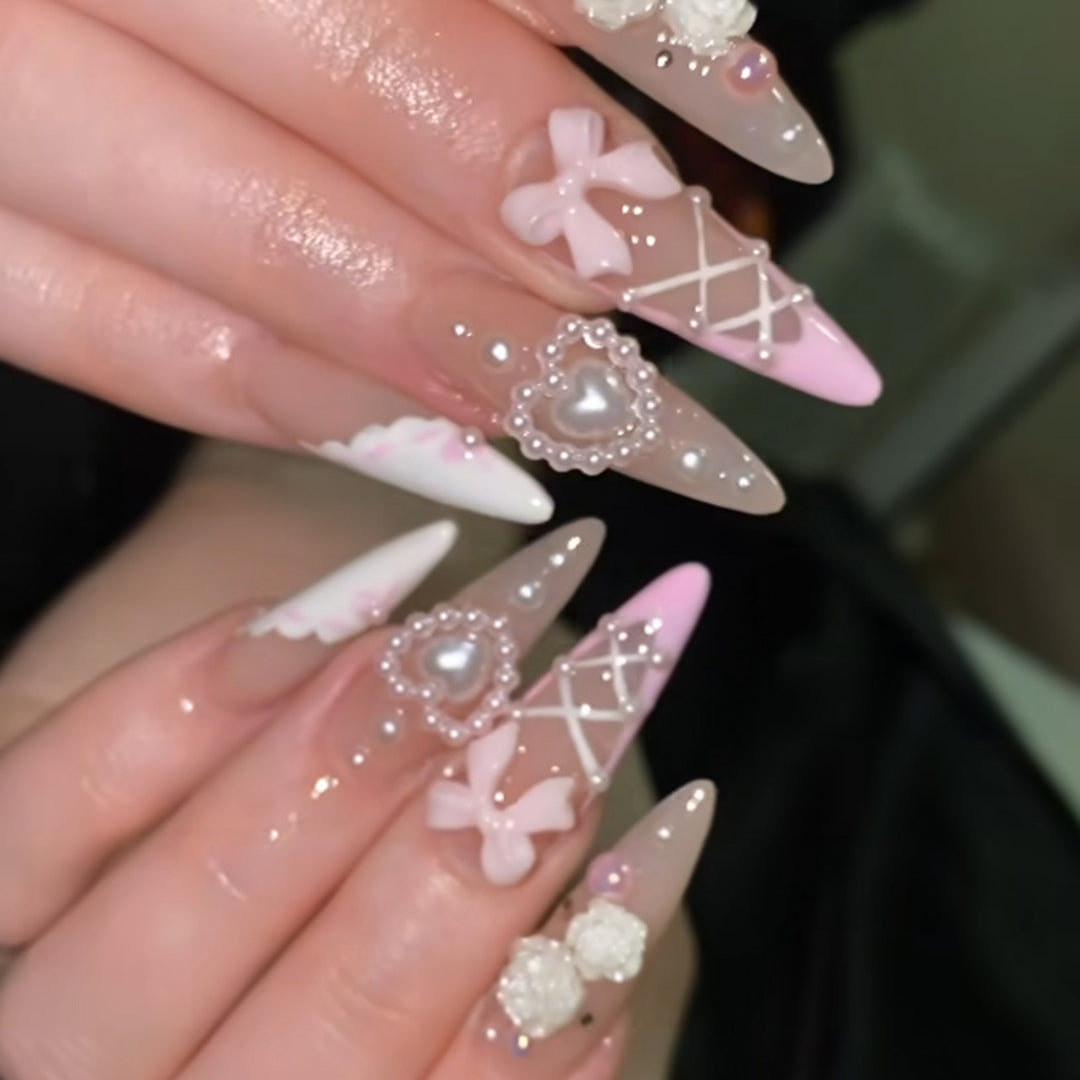 Artful stiletto nails with romantic accents Kalsten