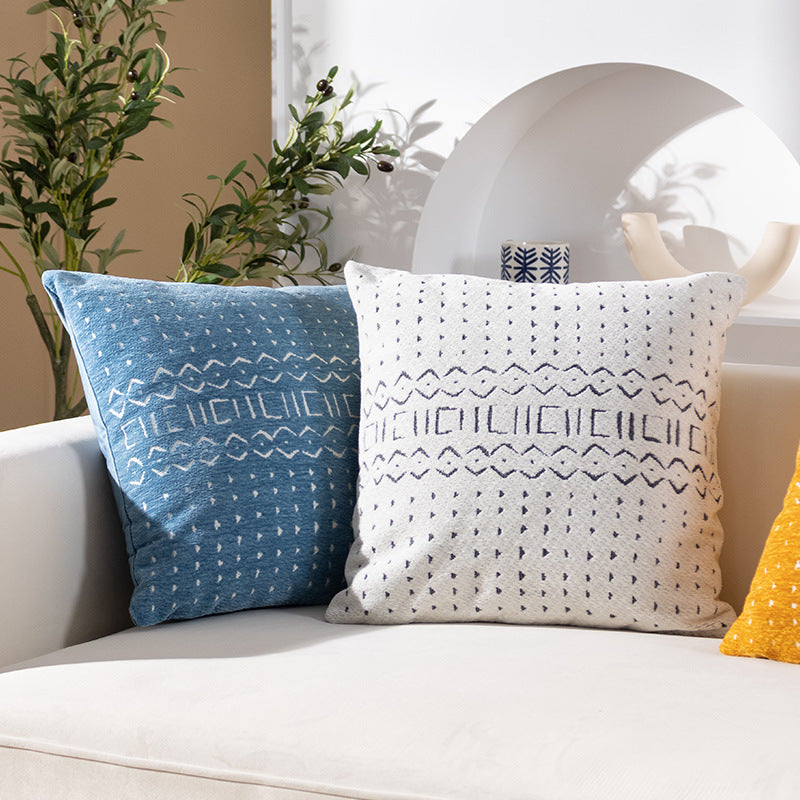 Woven pillow cover with geometric ethnic relief and textured tufting look Kalsten