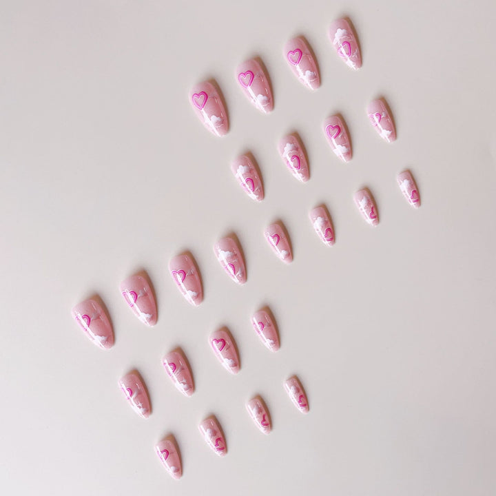 Artificial nail set with romantic heart accents and sparkling finish Kalsten