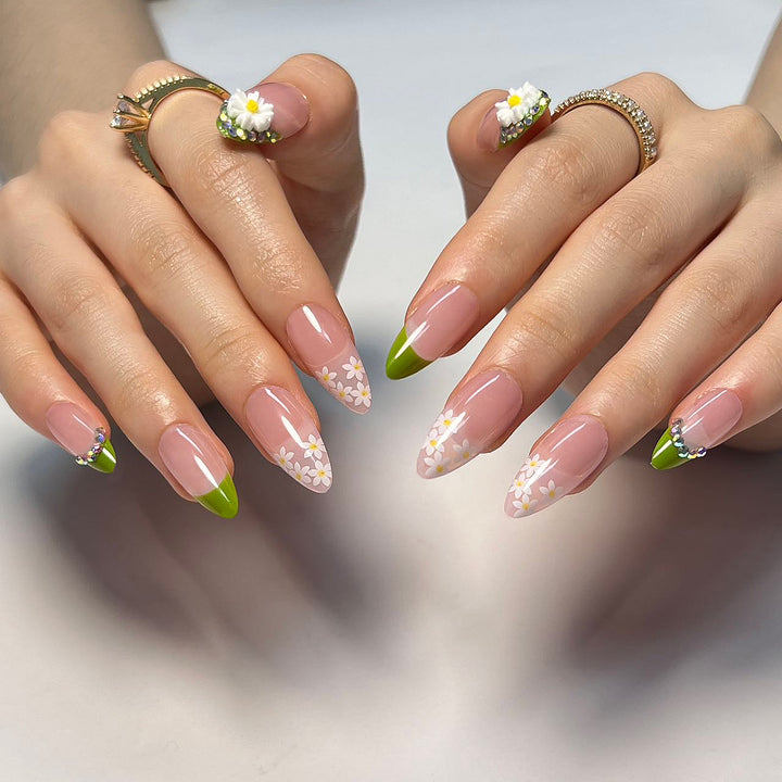 Artificial nails with floral accents and green French tip Kalsten