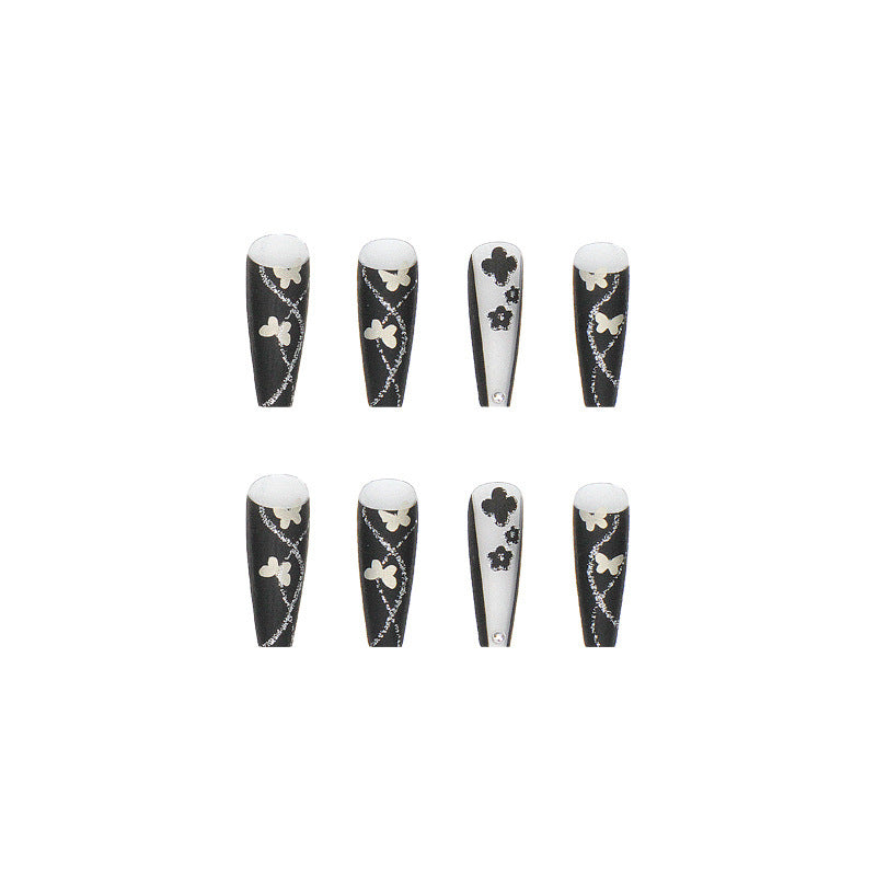Art nail set with elegant butterfly and flower motifs Kalsten