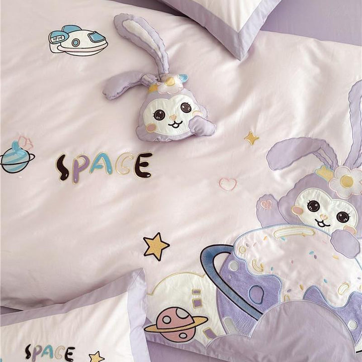 Children's bedding set with playful space bunny design