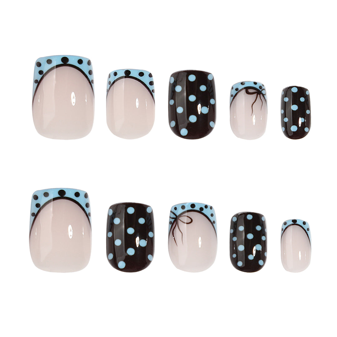Artful nail extensions with playful dots and elegant design Kalsten