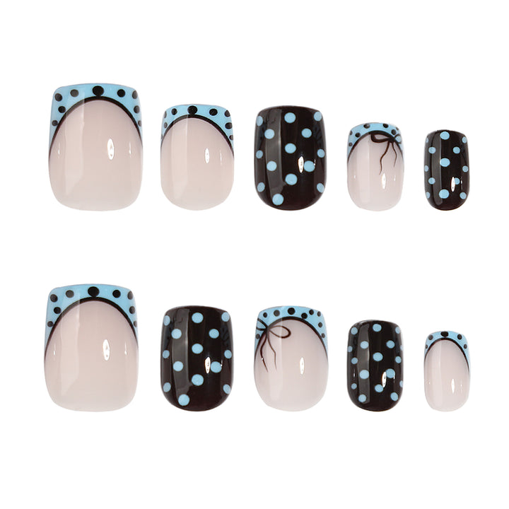 Artful nail extensions with playful dots and elegant design Kalsten