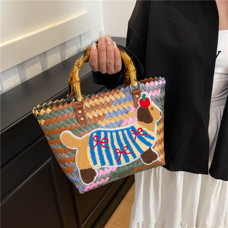 Shoulder bag with playful dog motif Kalsten
