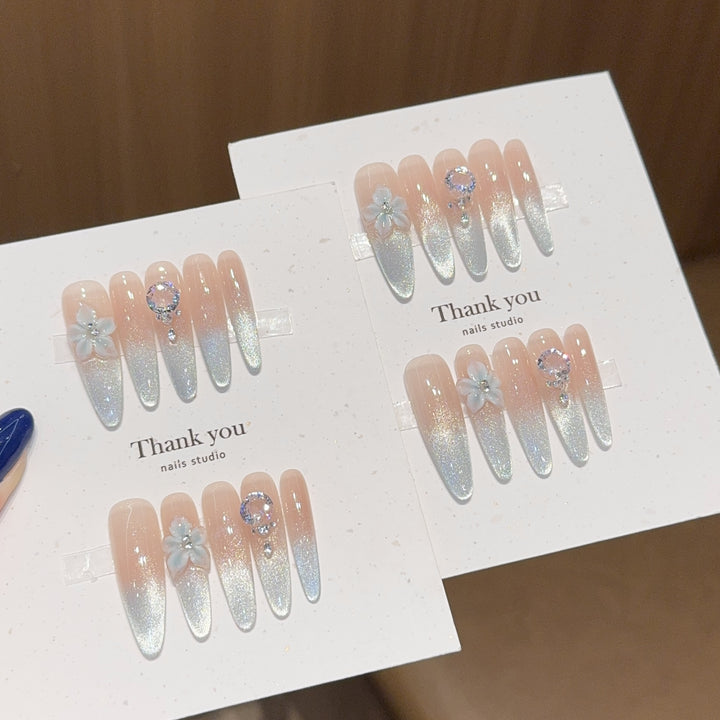 Artificial Nails Set with Shimmering Ombre Effect and Floral Accents Kalsten