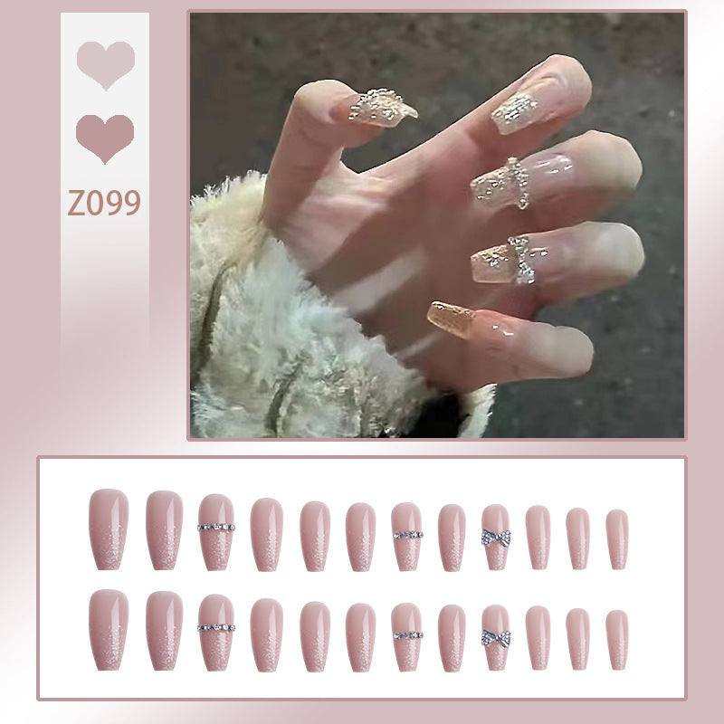 Glamorous artificial nails with sparkling rhinestone and glitter elements Kalsten