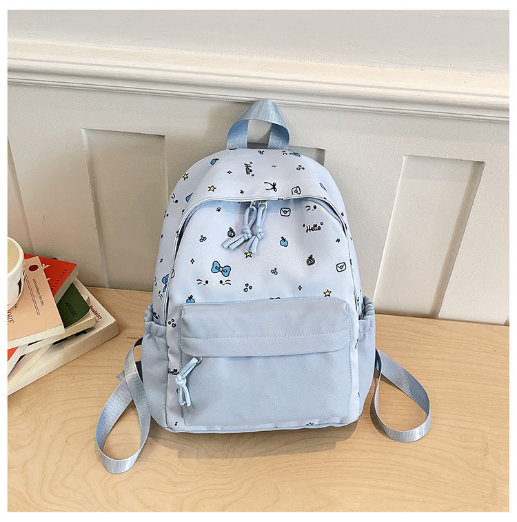 Cute everyday backpack with embroidered bows Kalsten