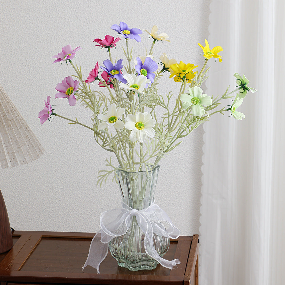 Elegant artificial flower bouquet with intricately detailed blooms