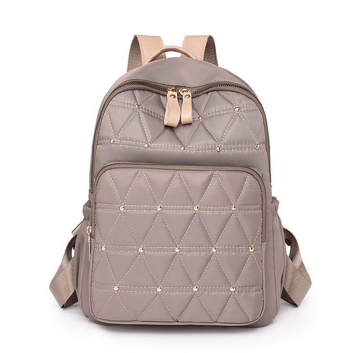 Stylish Quilted Backpack with Gold Accents