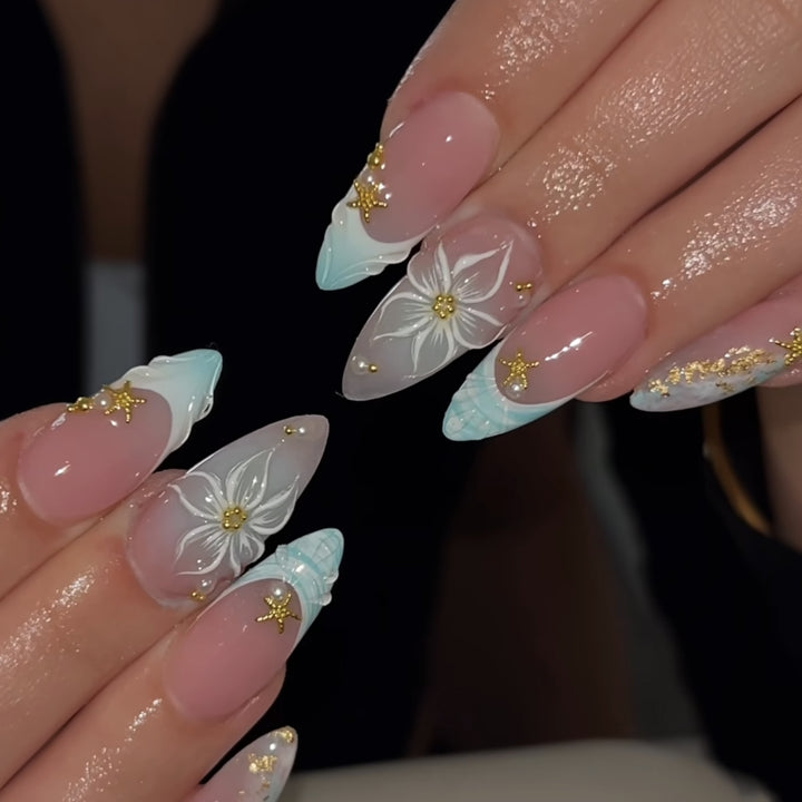 Artful stiletto nails with floral and glamorous accents Kalsten