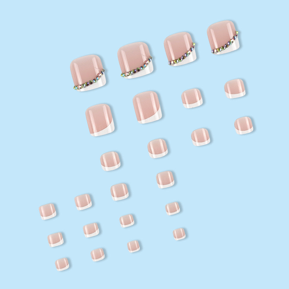 Nail art set with elegant French tips and glitter accents Kalsten