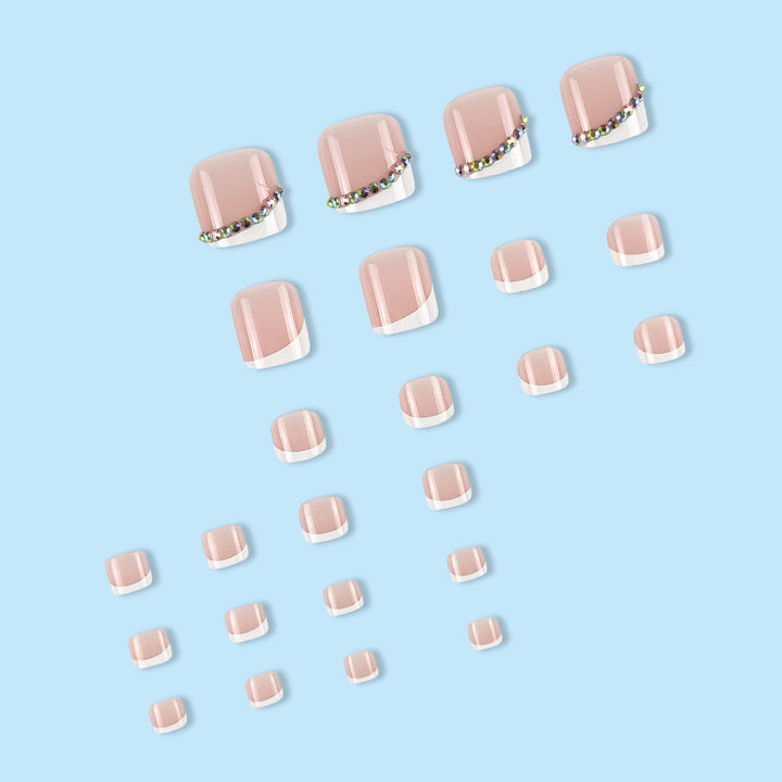 Nail art set with elegant French tips and glitter accents Kalsten