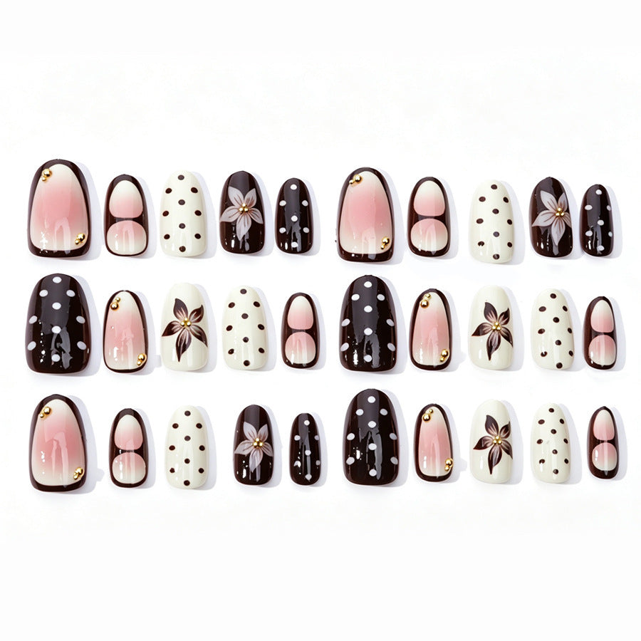 Acrylic nail set with floral accents and elegant design Kalsten