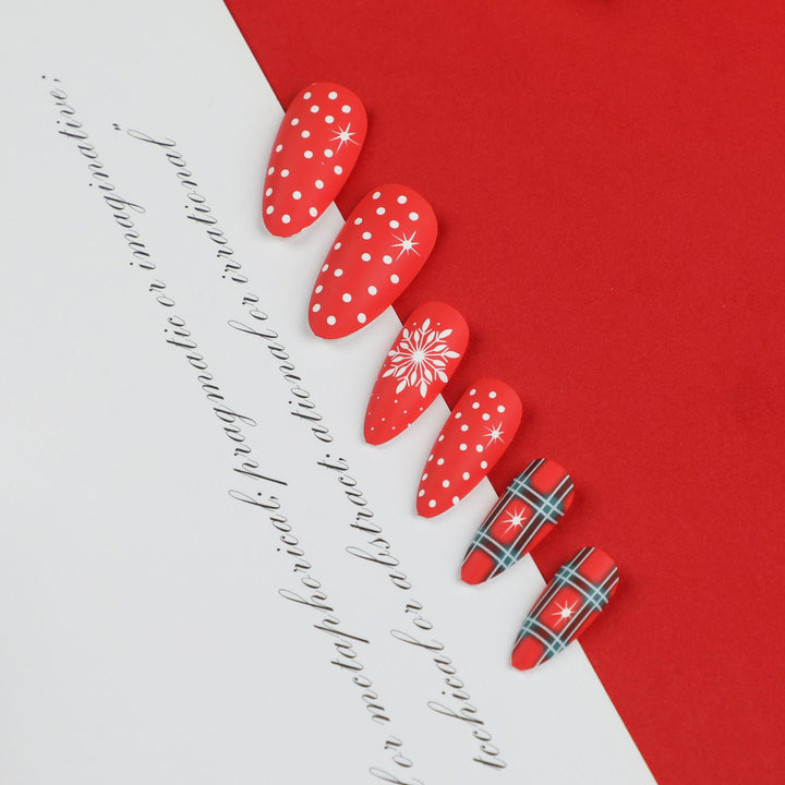Artful stiletto nails with festive design Kalsten
