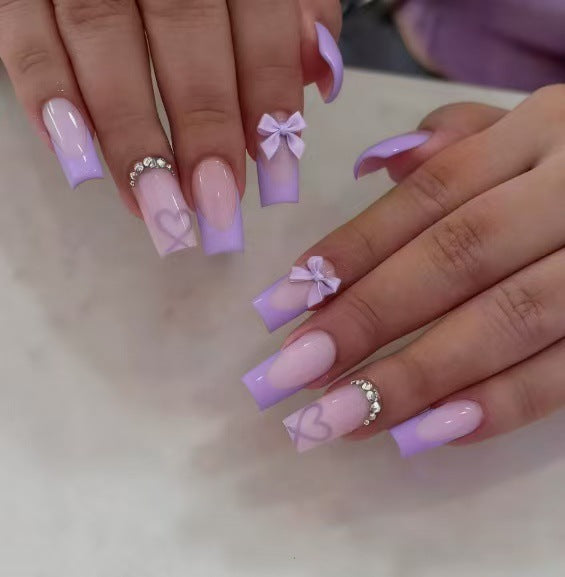 Artificial nail set with elegant 3D bows and glitter details Kalsten