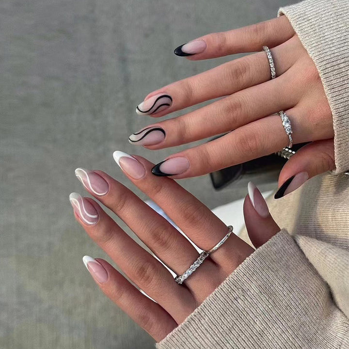 Elegant Artificial Nail Art with Curved Designs and Kalsten Accents