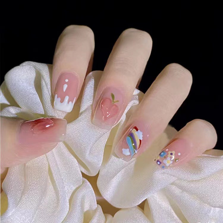 Creative nail art with fruit and flower motifs Kalsten