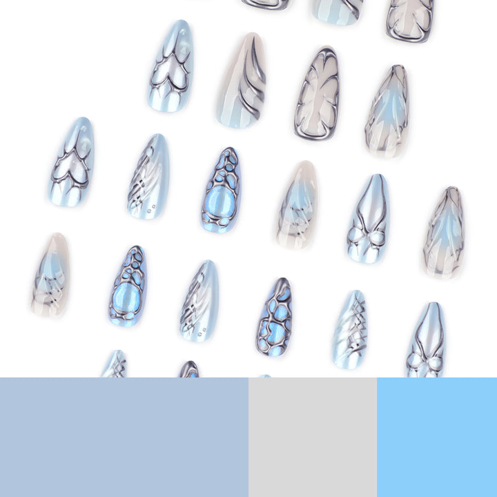 Artful stiletto nails with playful metallic details Kalsten