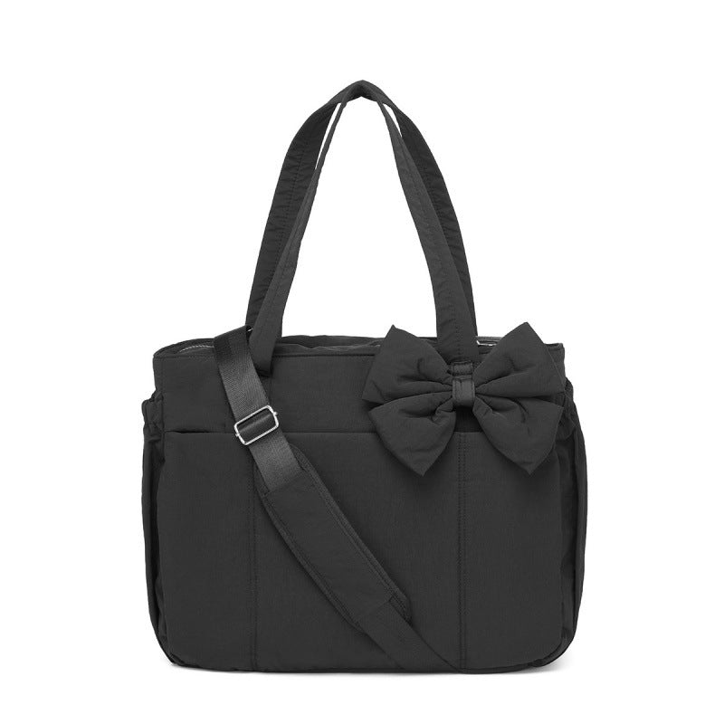 Fashionable tote bag with elegant bow appliqué Kalsten
