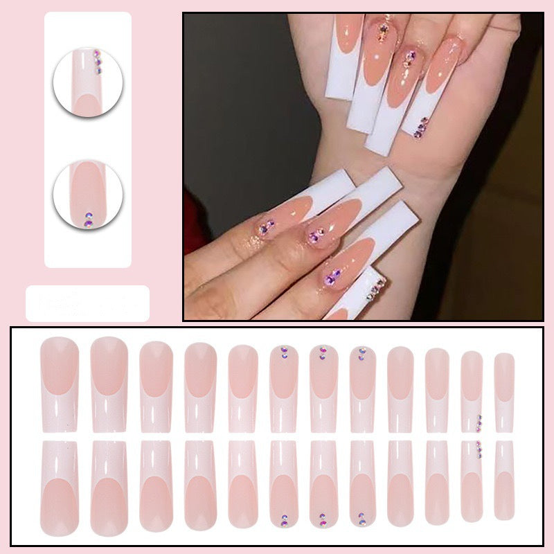 Nail set with elegant French tips and sparkling rhinestone embellishments Kalsten