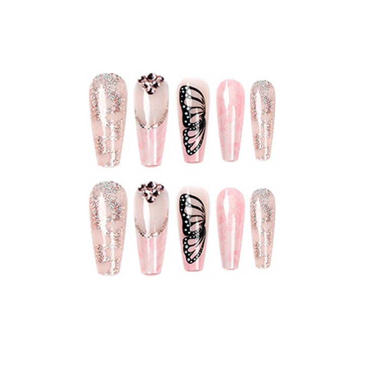 Glamorous nail extensions with beautiful butterfly motifs and glitter accents Kalsten