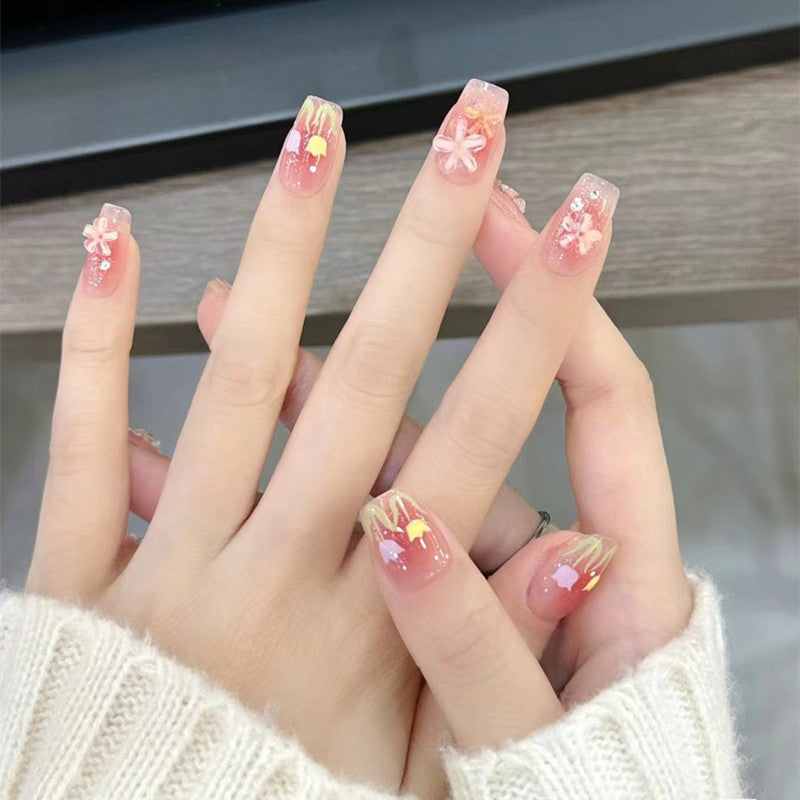 Artificial nails with floral design and glitter effects Kalsten