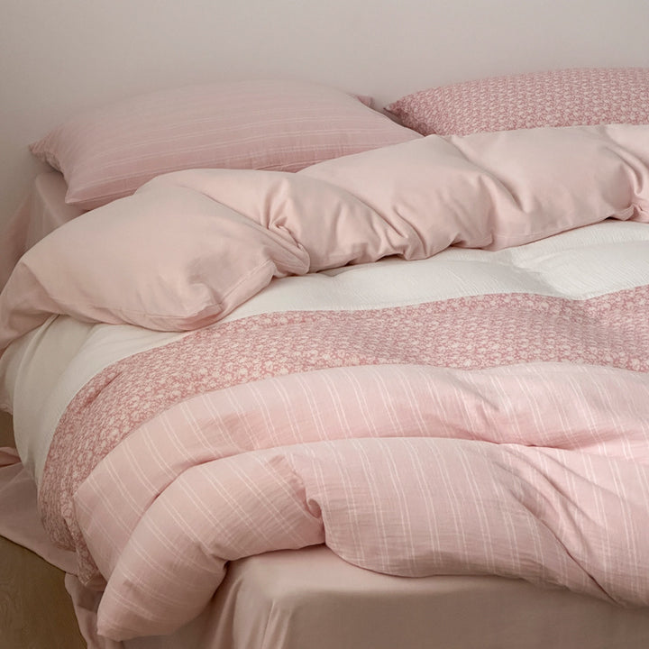 Luxurious cotton satin bedding set with striped and floral patchwork