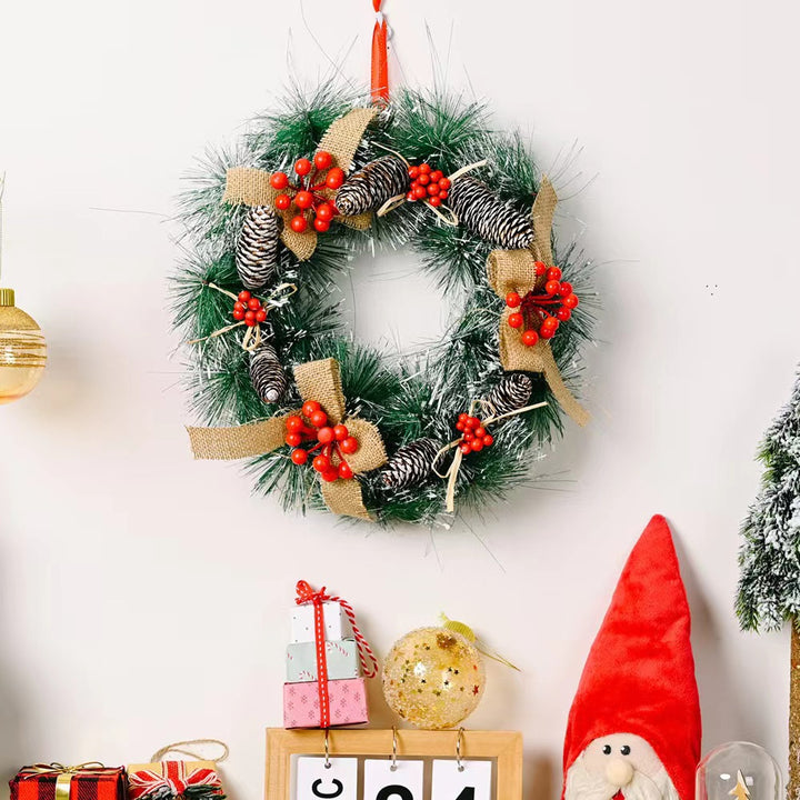 Festive Christmas wreath with pine cones and berries Kalsten