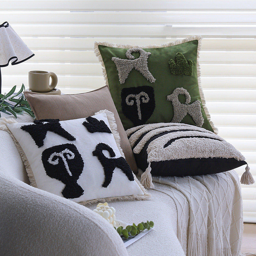 Square decorative cushion cover with hand-tufted ethnic appliqué motif and fringed edge Kalsten