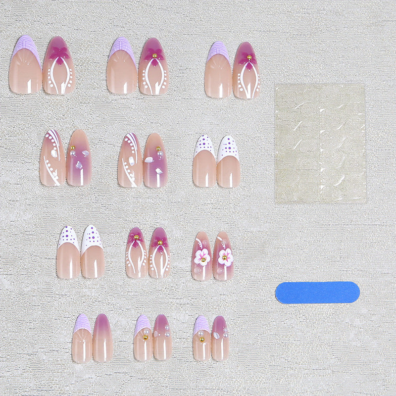 Artificial nail set with exotic floral and glitter accents Kalsten