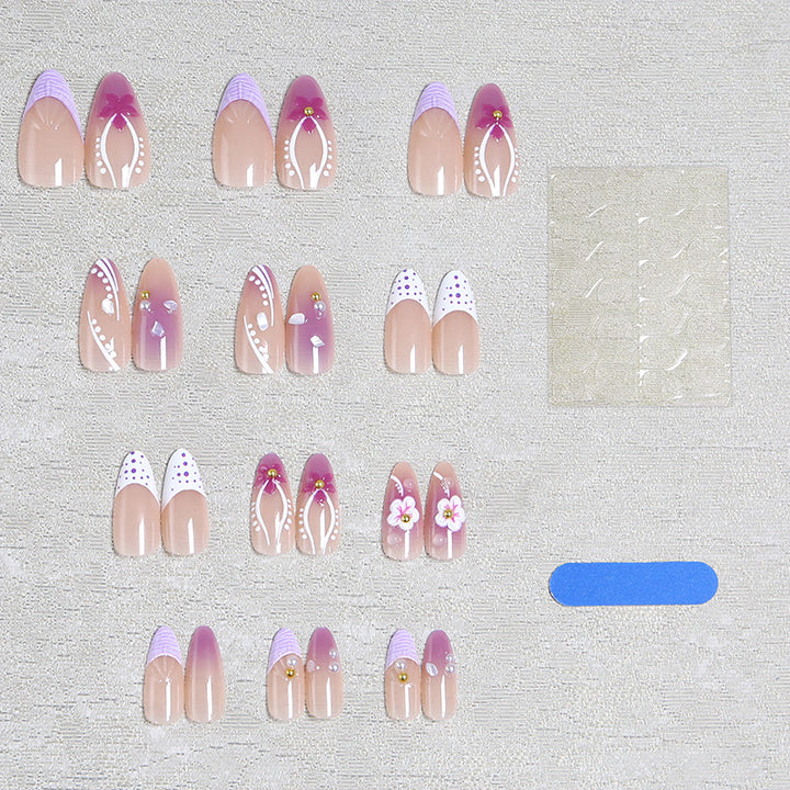 Artificial nail set with exotic floral and glitter accents Kalsten