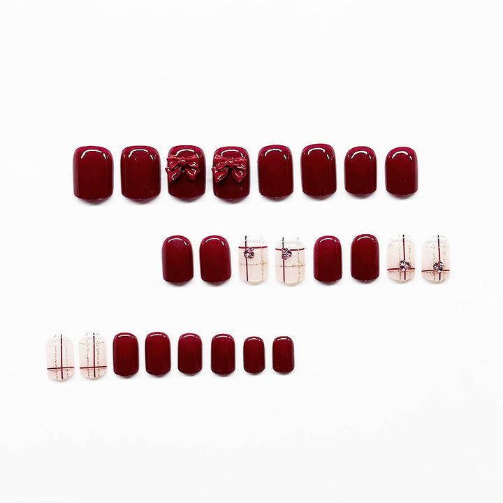 Decorative Press-On Nail Art Extensions with Bow Accents Kalsten