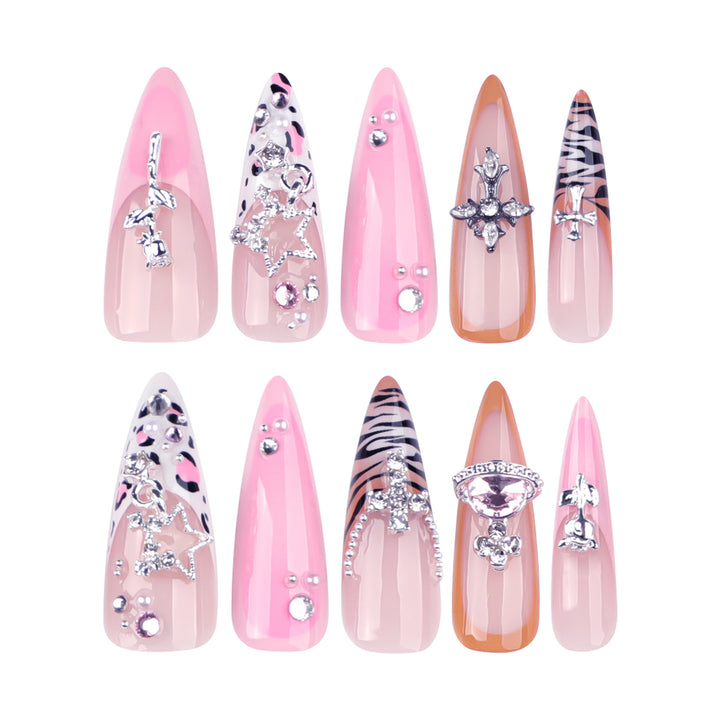 Artful stiletto nails with glitter and rhinestone embellishments Kalsten
