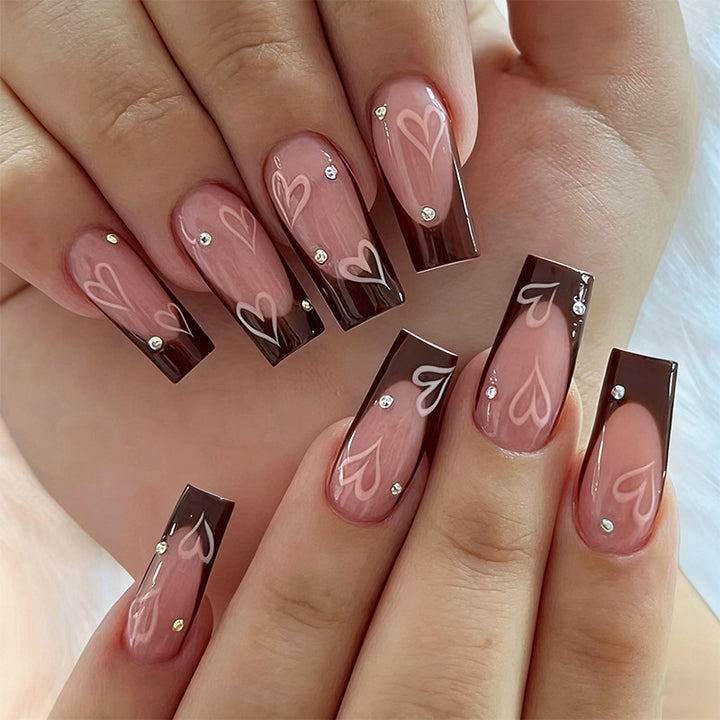 Elegant artificial nails with heart pattern and glitter accents Kalsten