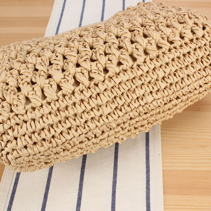 Handbag made of naturally untreated woven material with elegant chain embellishment Kalsten