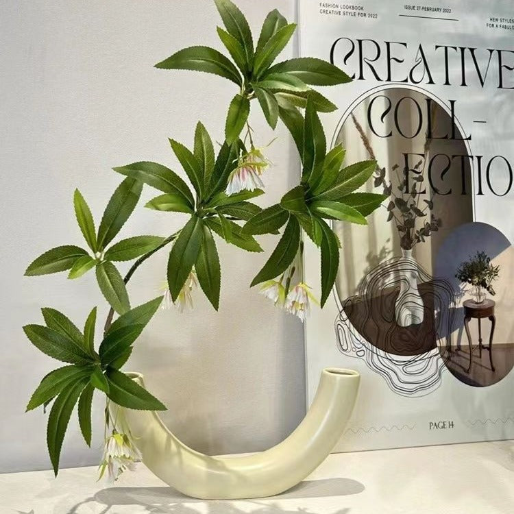 Elegant Curved Ceramic Flower Vase for Home Decor