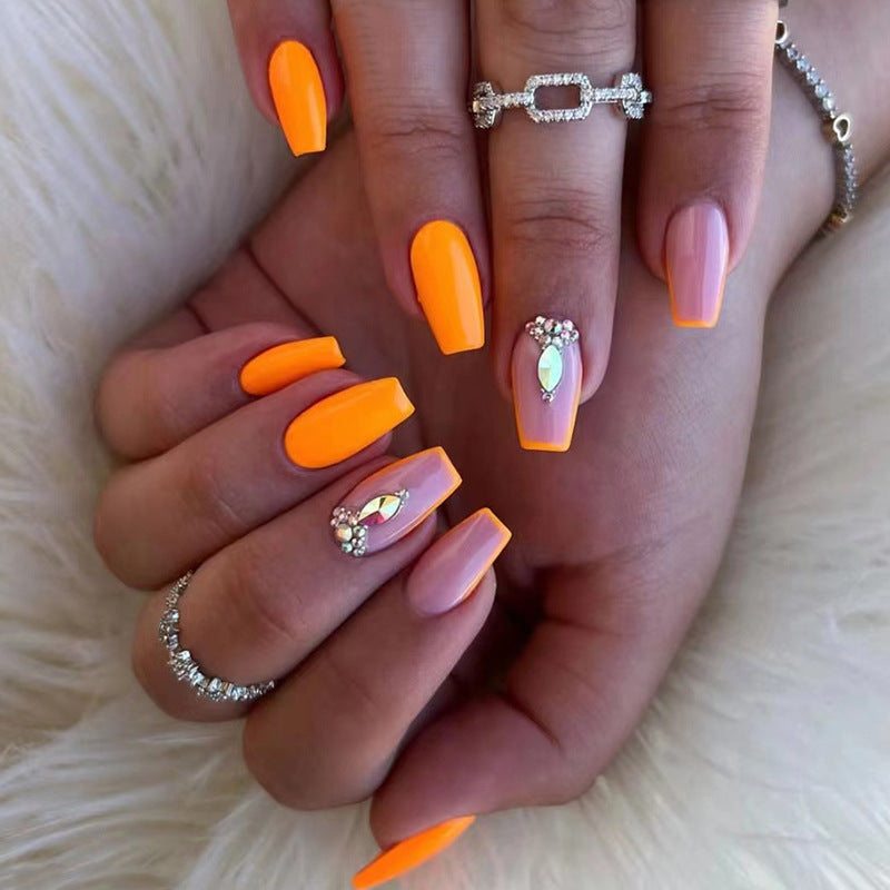 Acrylic nail set with trendy neon colors and rhinestone accents Kalsten