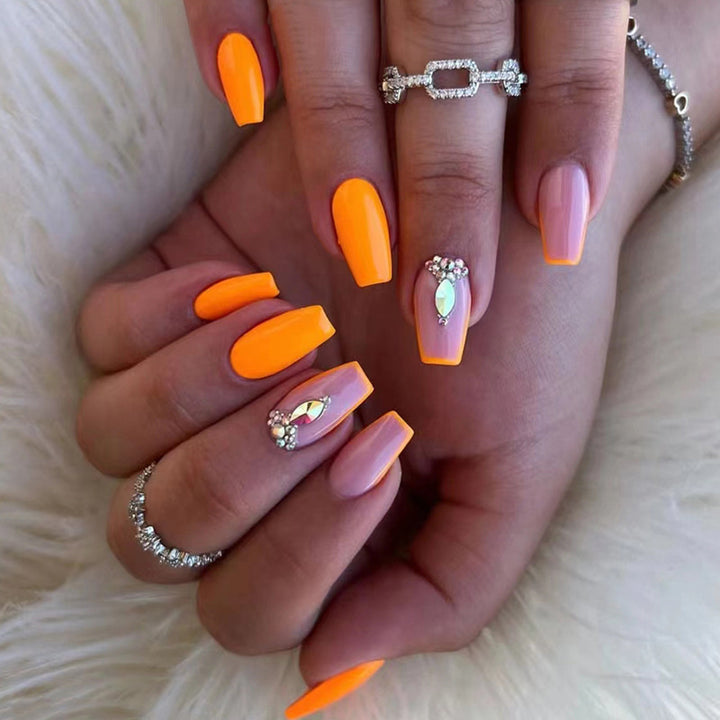 Acrylic nail set with trendy neon colors and rhinestone accents Kalsten