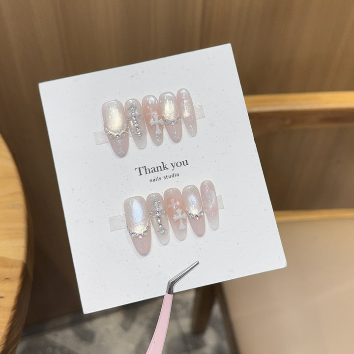 Artificial nails with sparkling rhinestone and glitter effects Kalsten