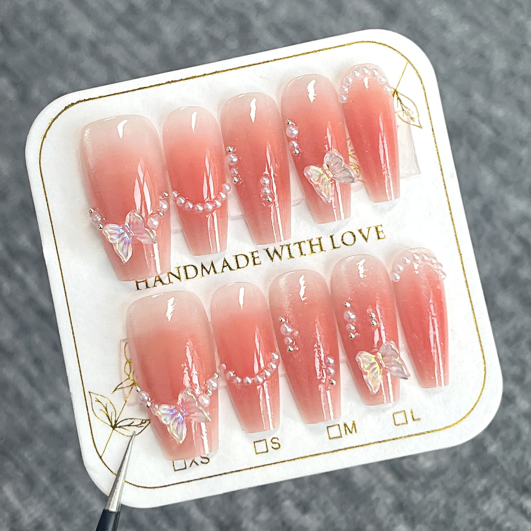 Glamorous artificial nails with elegant bow and butterfly design Kalsten