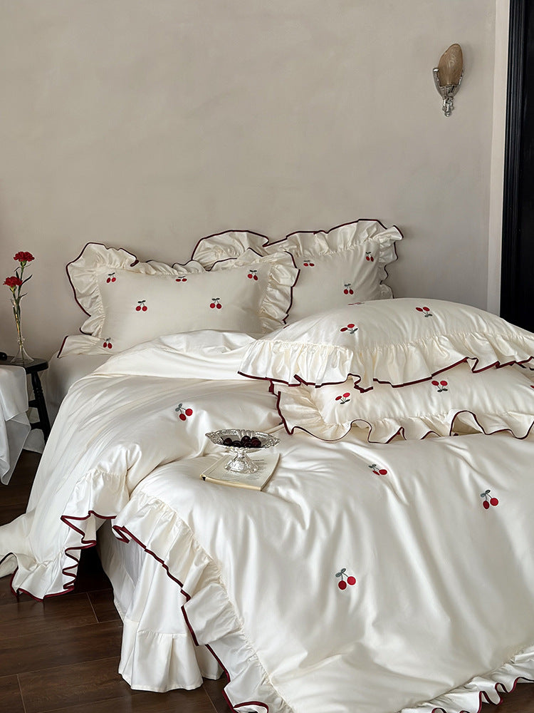 Luxury bedding set made of cotton satin with ruffles and cherry embroidery