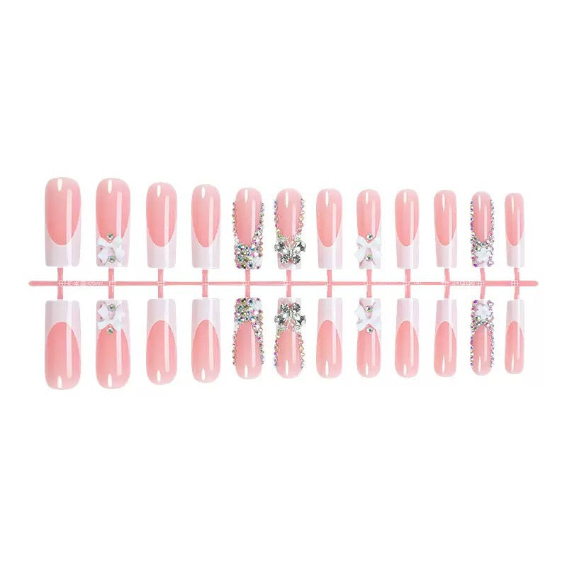 Artificial nail set with shimmering rhinestone decorations and floral design Kalsten