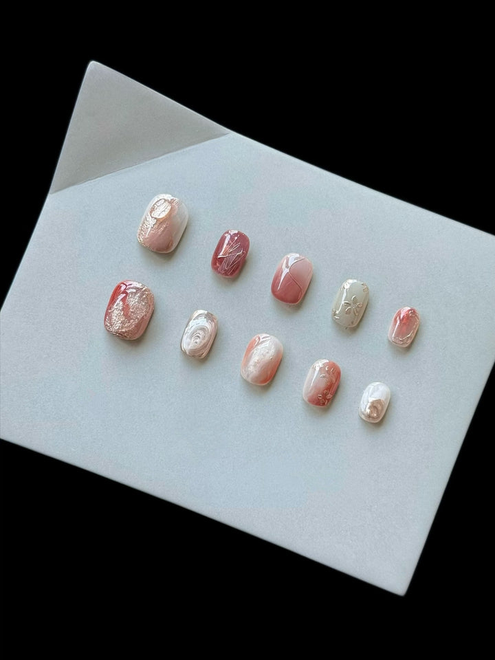 Artistic Press-On Nail Set with Marble and Metallic Accents