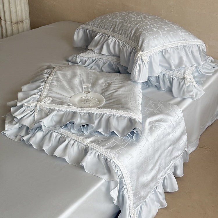 Satin bedding set with jacquard bow relief, gathered ruffle and lace trim