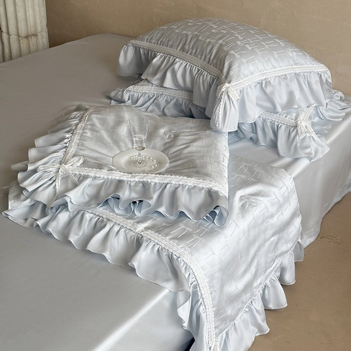 Satin bedding set with jacquard bow relief, gathered ruffle and lace trim