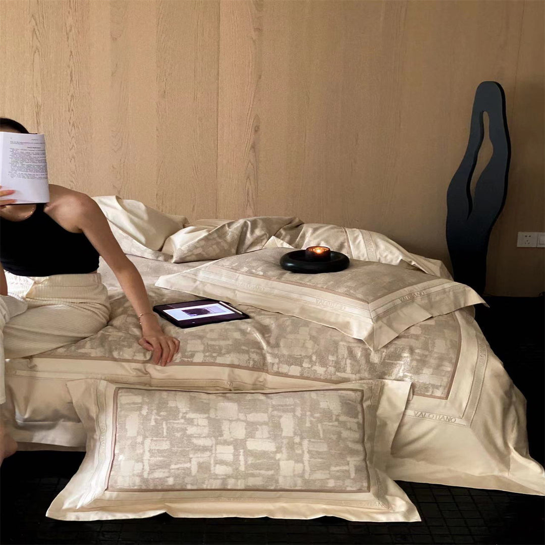 Premium bed set made of heavy cotton satin with woven mosaic relief and double stitched hem