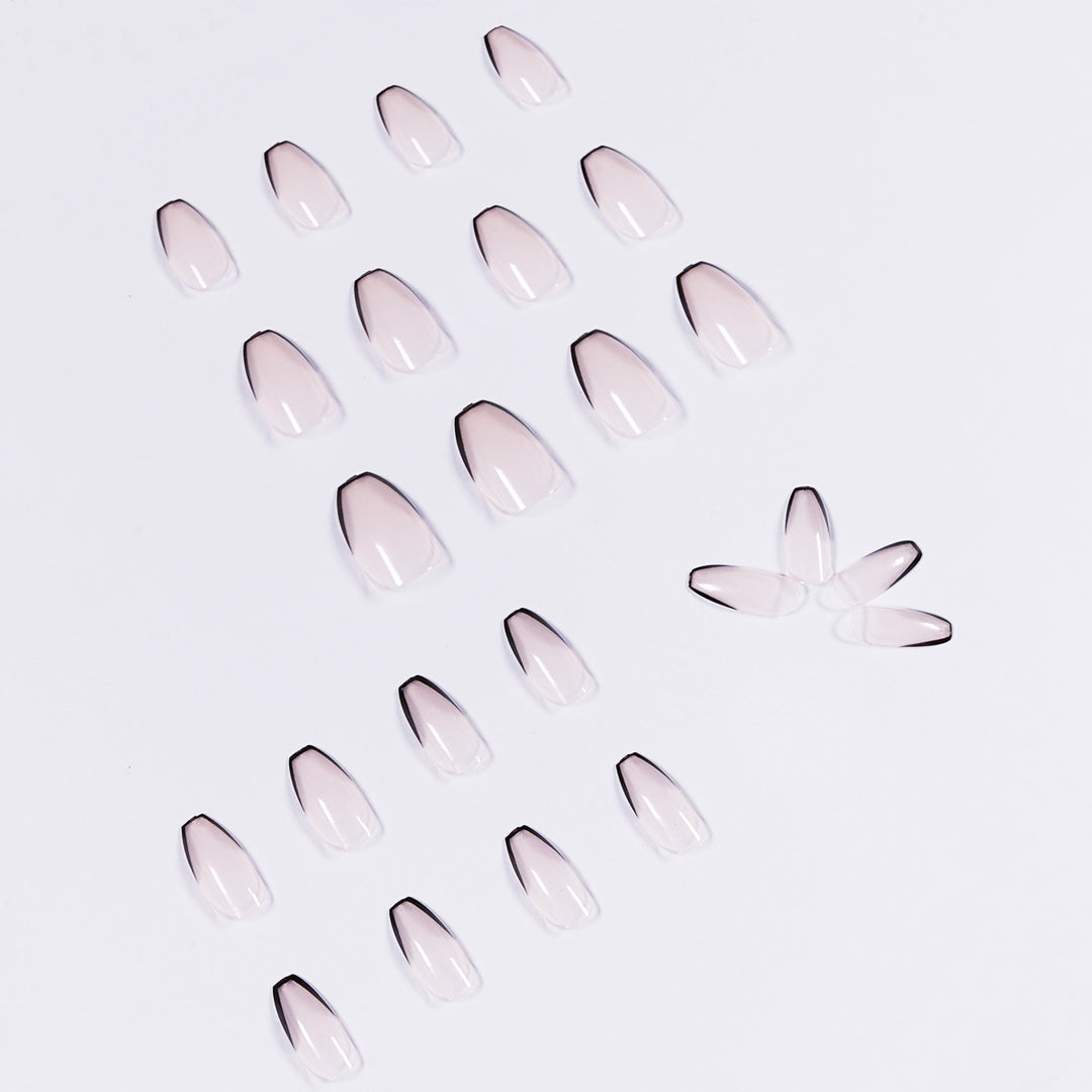 Artful stiletto nails with elegant black tip decoration Kalsten