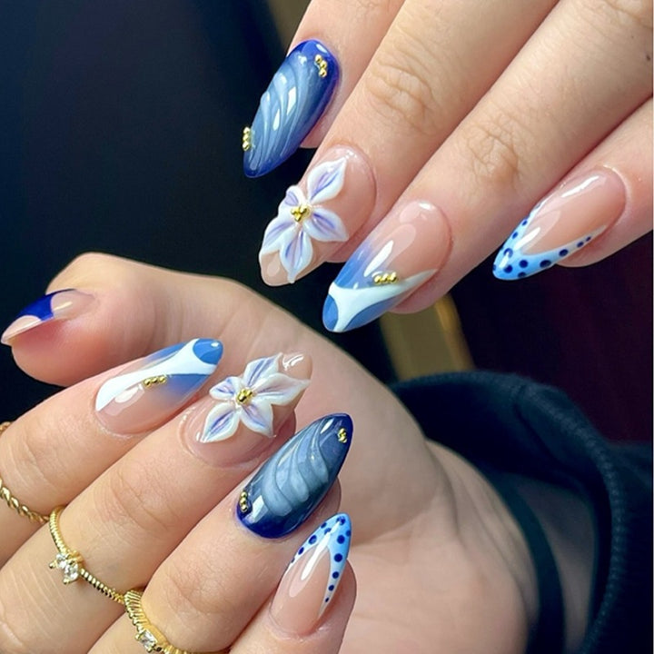 Nail set with handmade floral designs and elegant glitter Kalsten